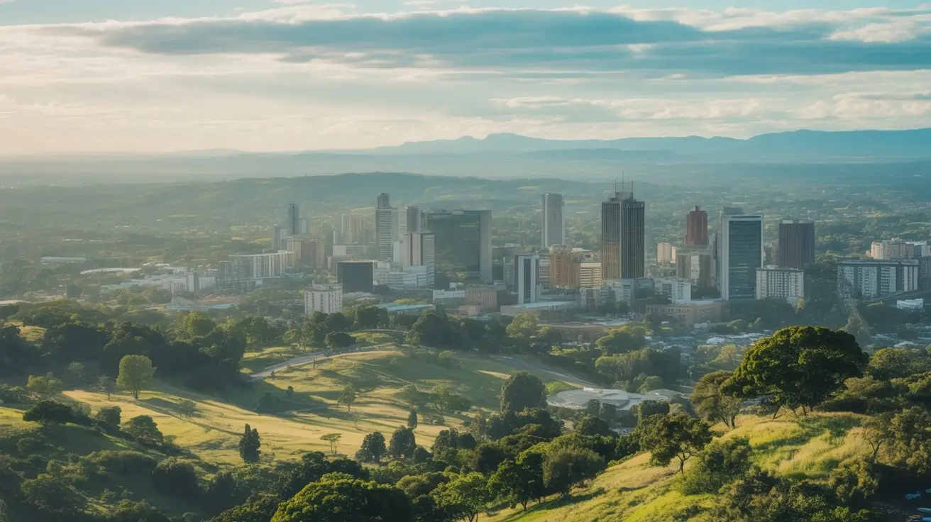 Harare city skyline surrounded by greenery under clear skies, showing typical weather conditions in Zimbabwe