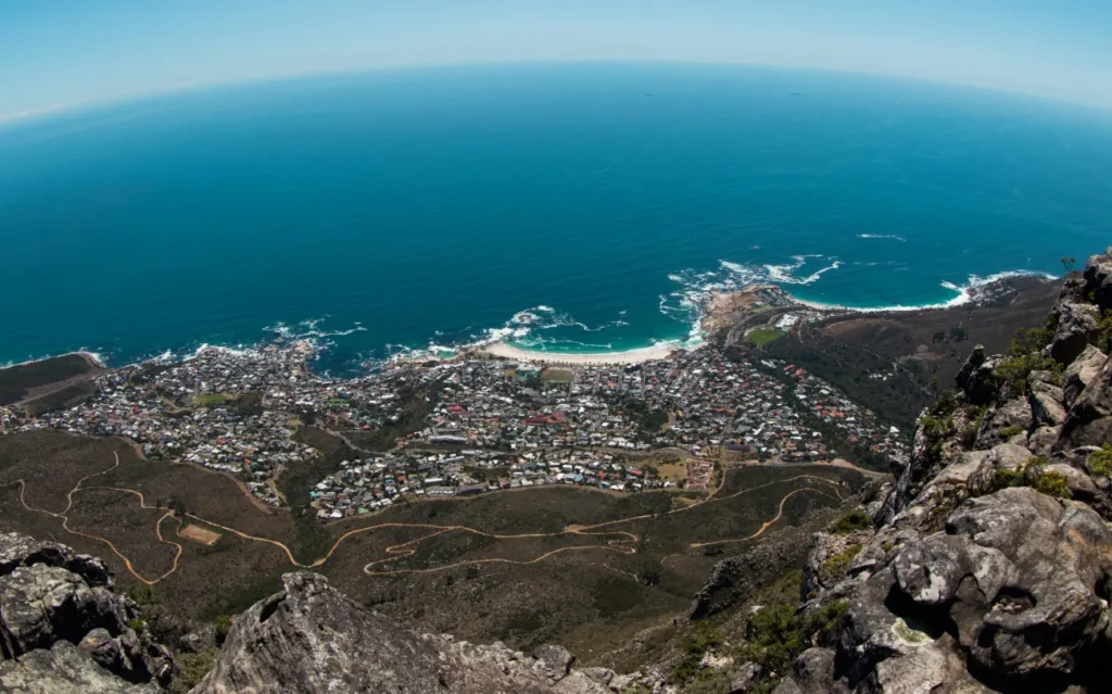 Book now pay later flights to South Africa — aerial view of Cape Town and Atlantic Ocean from Table Mountain