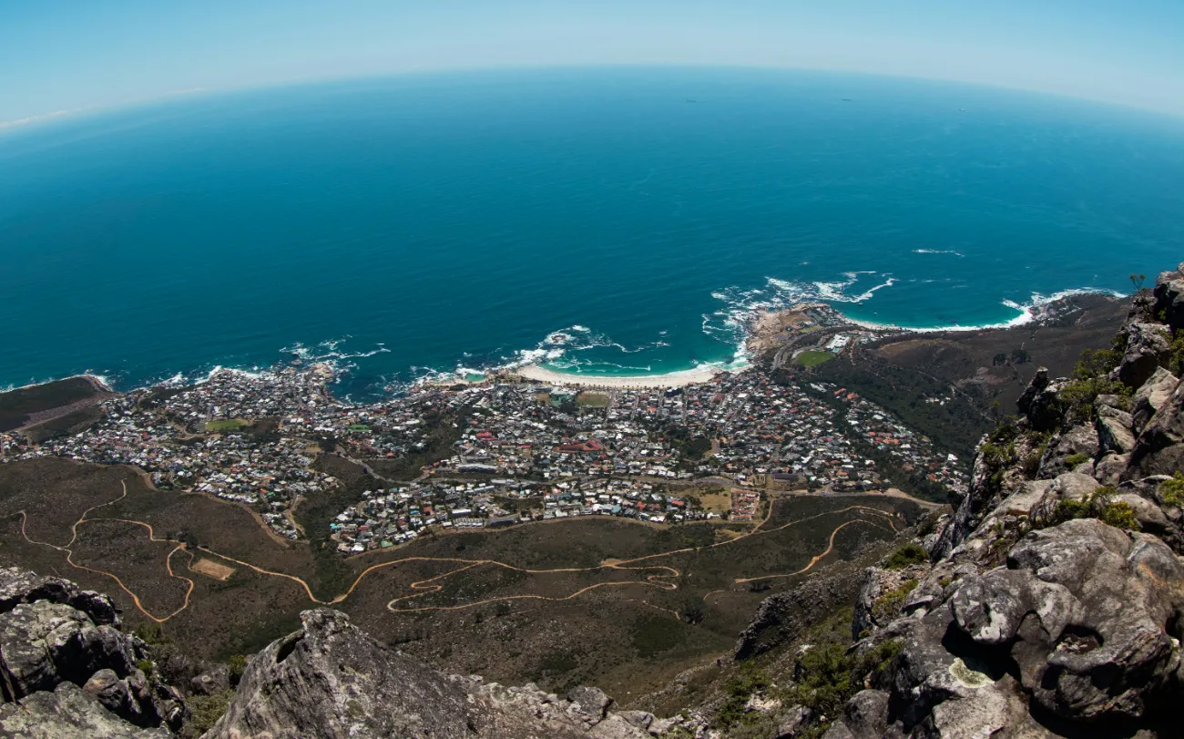 Book now pay later flights to South Africa — aerial view of Cape Town and Atlantic Ocean from Table Mountain