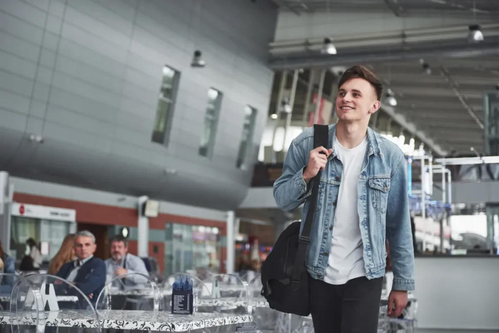 Student at airport booking flights book now pay later no credit check UK – Skylines Trips